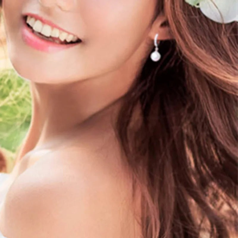 boucle d'Oreille Mariage Perle Pendante sur une femme marié