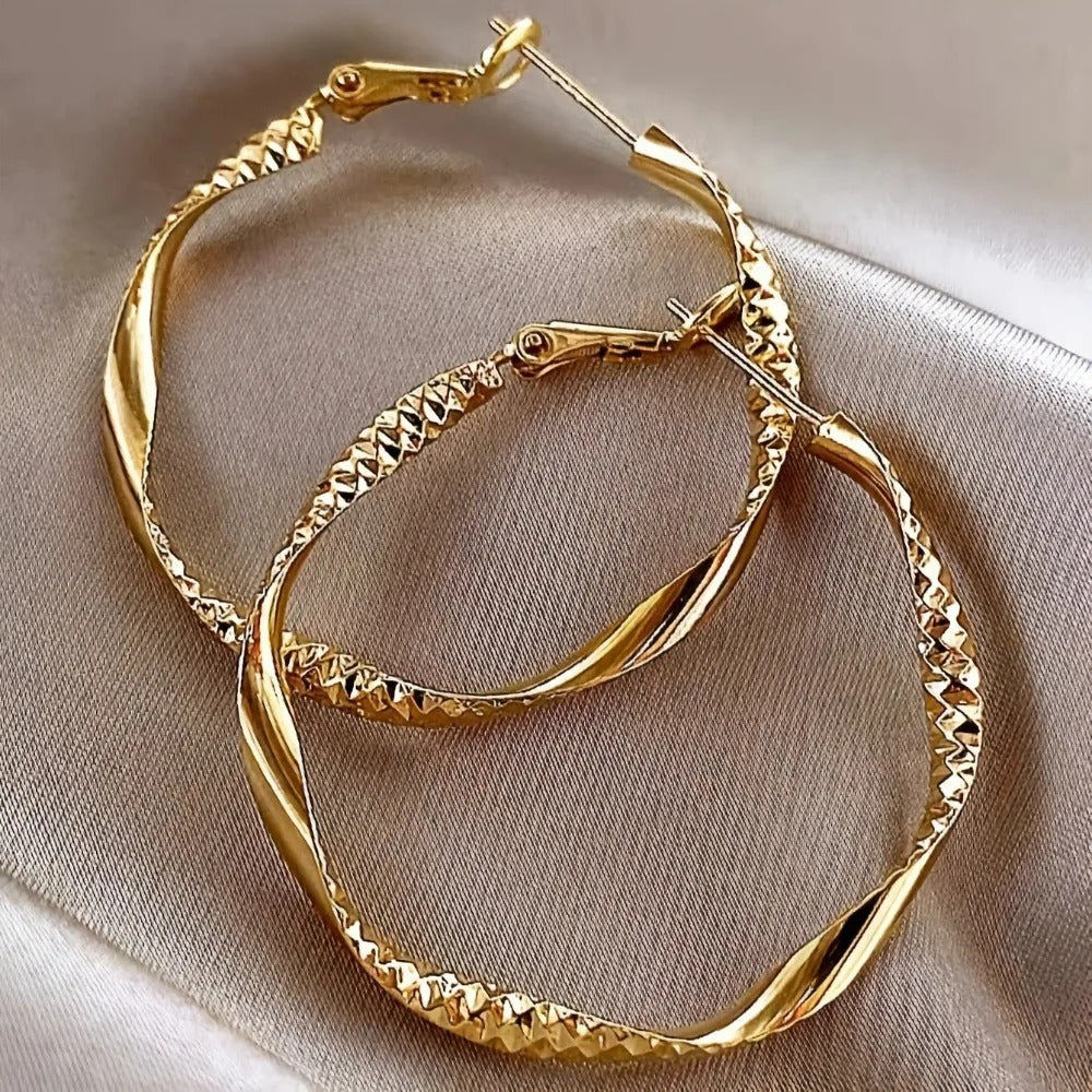 Boucle D'oreille Anneau Femme Texturé Et Torsadé Image