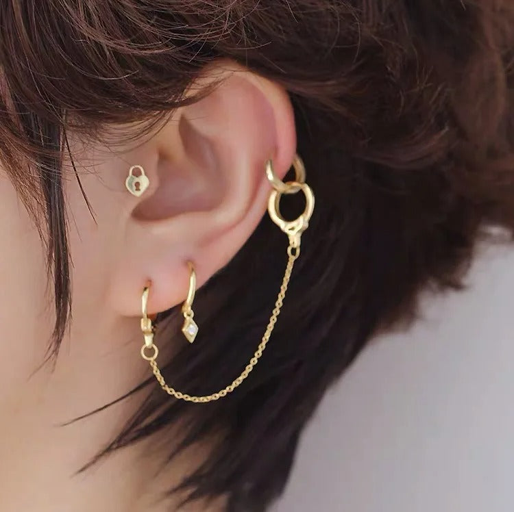 Boucle D'Oreille Chaine 2 Trous Dorée Menottes
