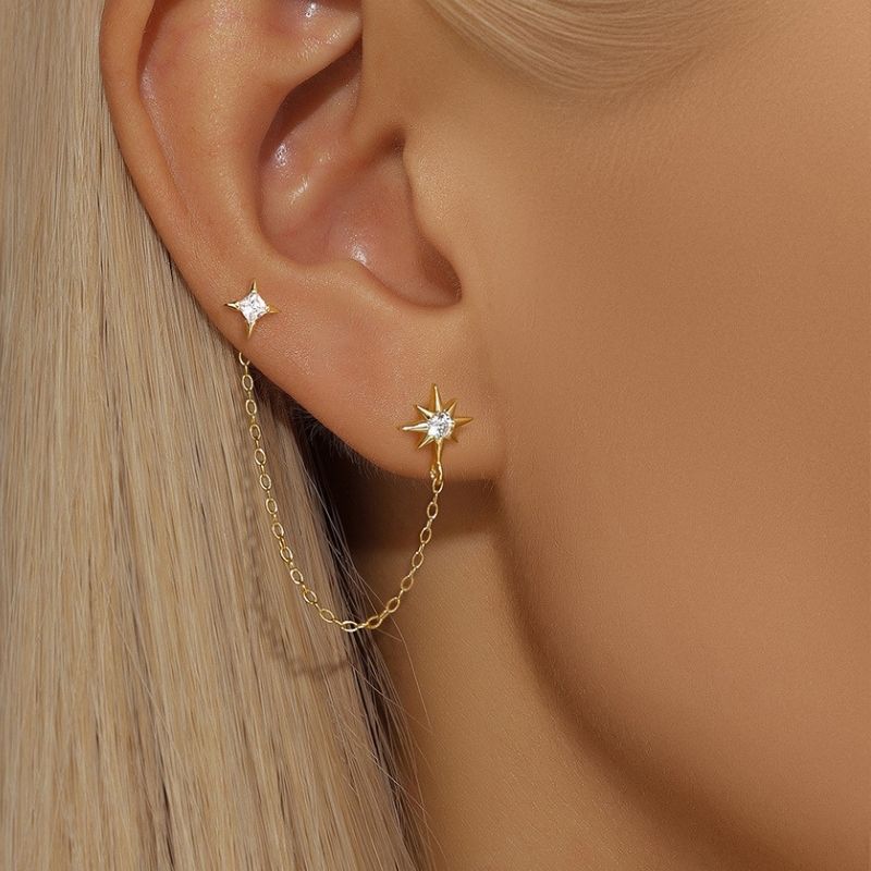 Boucle d'Oreille Chaine Deux Étoiles Dorées