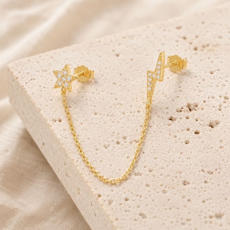 Boucle d'Oreille Chaine Étoile Et Éclair Dorée