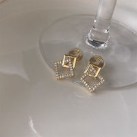 Boucle D'Oreille Clip Femme Graphique Dorée