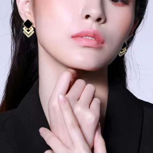 Boucle D'Oreille Clip Femme Graphique Dorée Et Noire