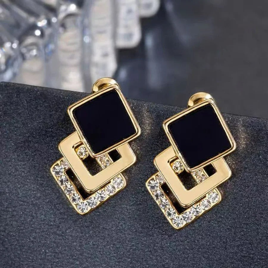 Boucle D'Oreille Clip Femme Graphique Dorée Et Noire Image