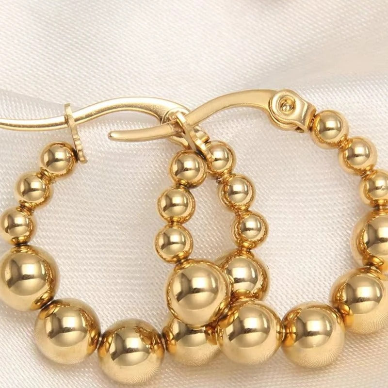 Boucle D'oreille Créole Perles Dorées en Acier Inoxydable Image