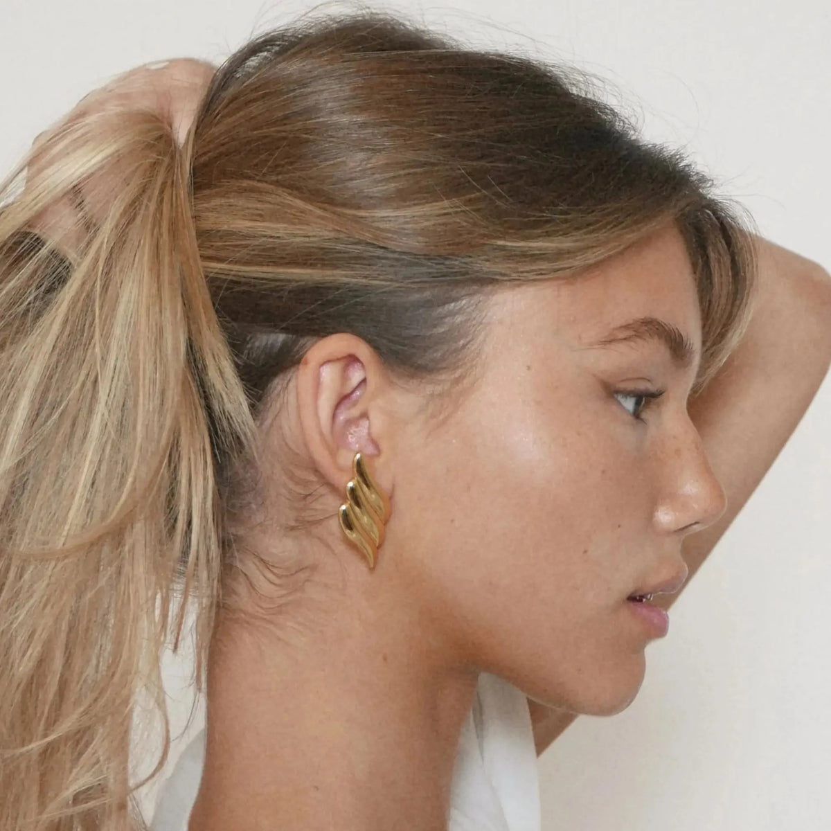 Boucle d'Oreille Dorée Aile en Acier Inoxydable