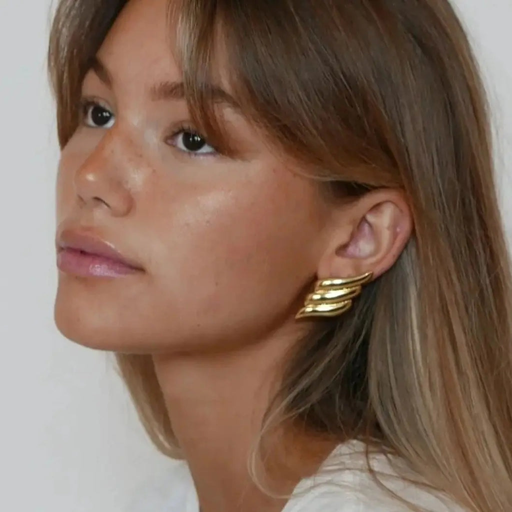 Boucle d'Oreille Dorée Aile en Acier Inoxydable