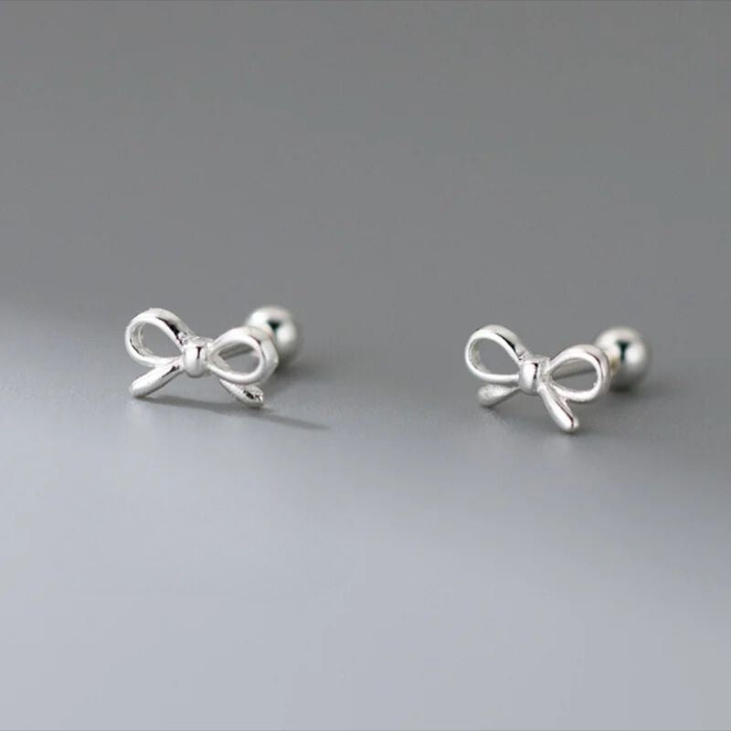 Boucle d'Oreille Enfant Argentée Petit Nœud Image