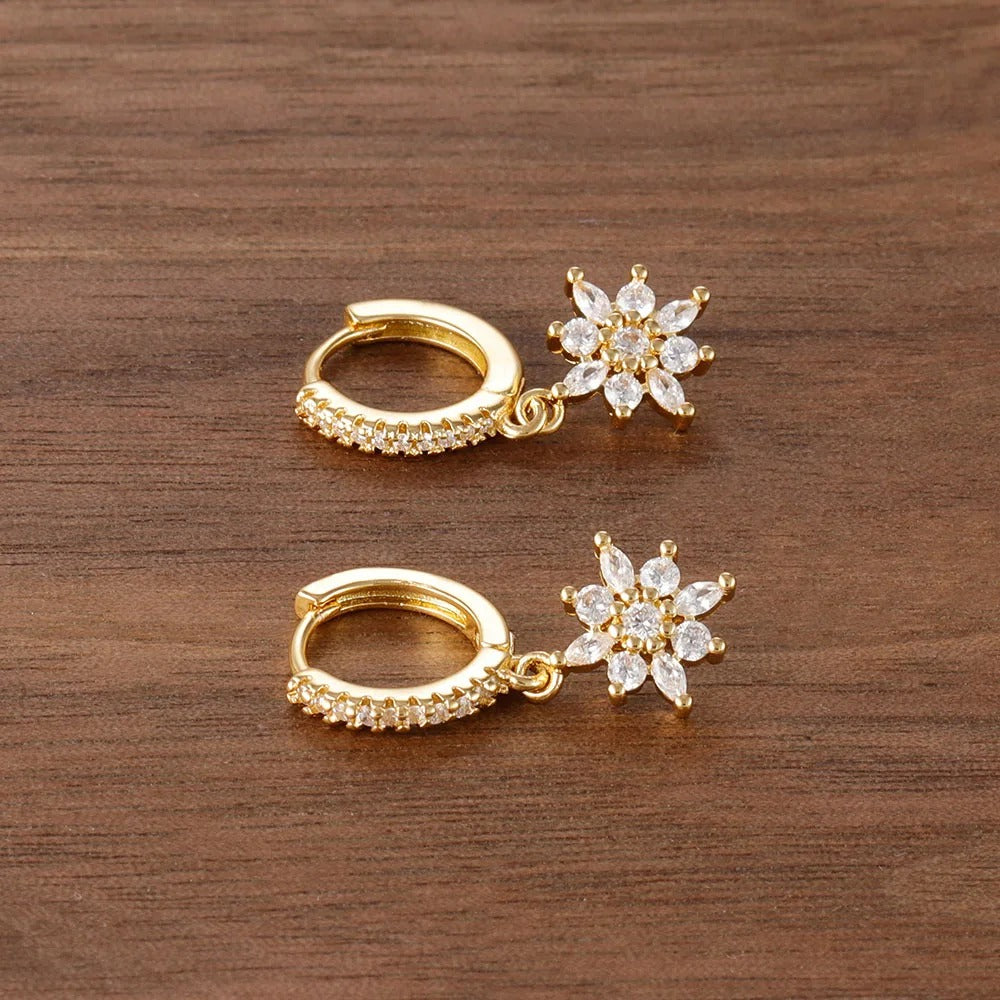 Boucle D’oreille Femme Créole Fleur Dorée – Acier Inoxydable Image