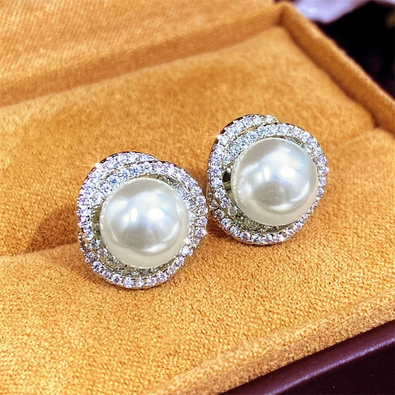 Boucle d'Oreille Femme Perle Design Croisé Image