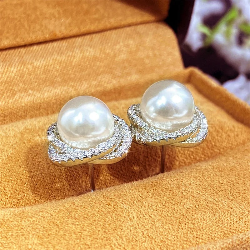 Boucle d'Oreille Femme Perle Design Croisé Image