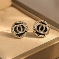 Boucle d'Oreille Luxe Femme en Acier