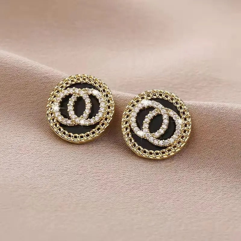 Boucle d'Oreille Luxe Femme en Acier