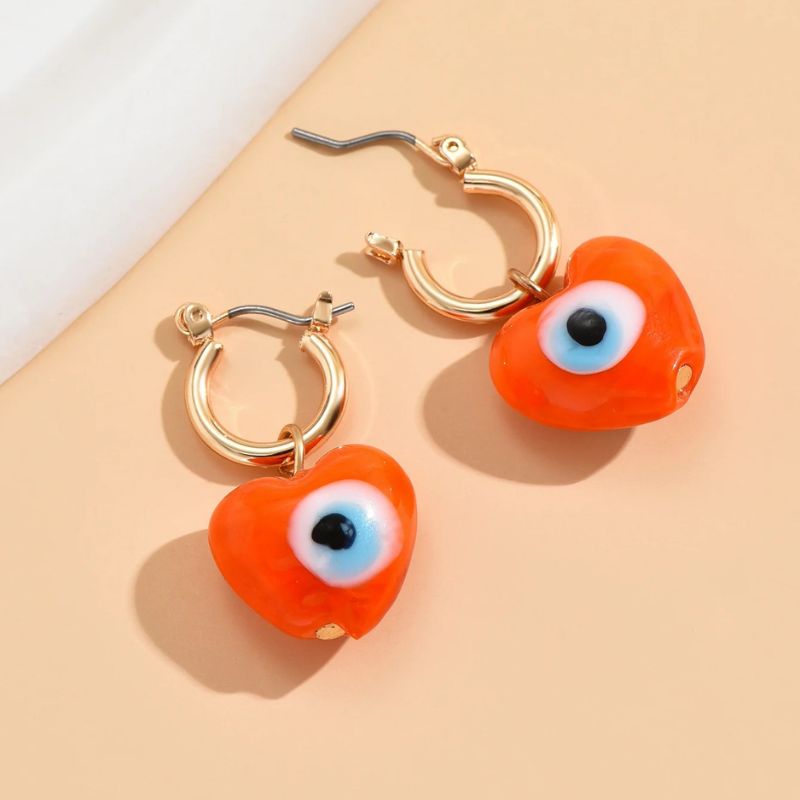 Boucle D'Oreille Orange Cœur Œil Protecteur Image