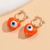 Boucle D'Oreille Orange Cœur Œil Protecteur