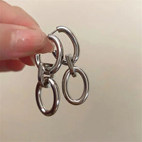 Boucle d'Oreille Pendante Argentée Géométrique Et Moderne