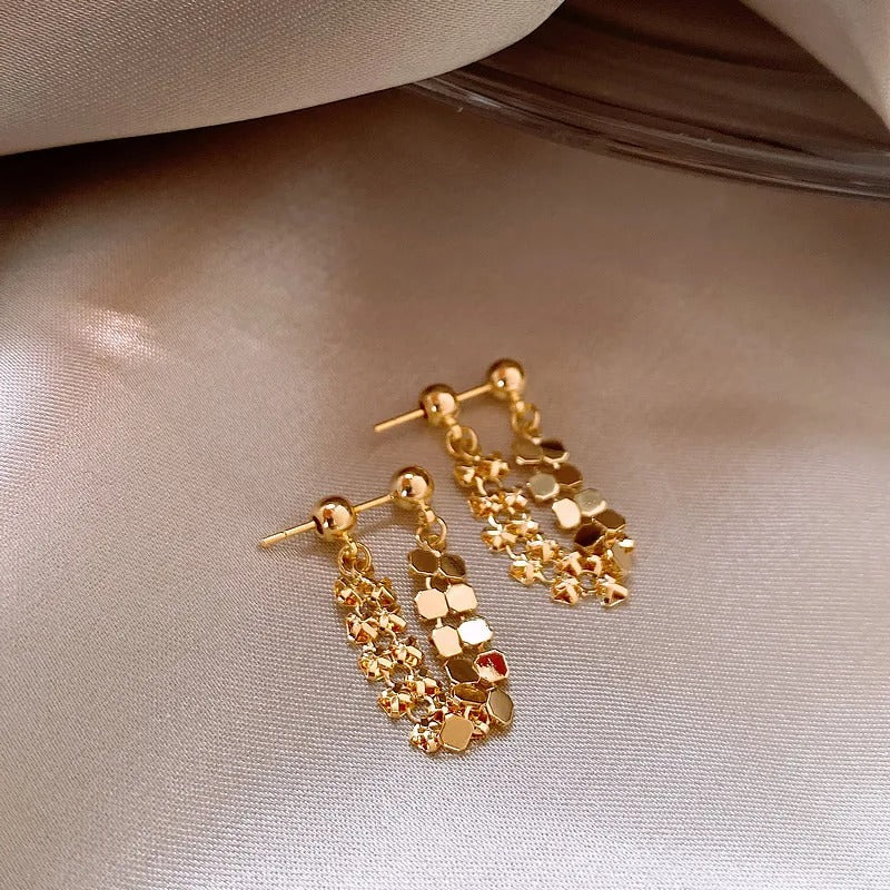 Boucle D'oreille Pendante Doré Délicate Image