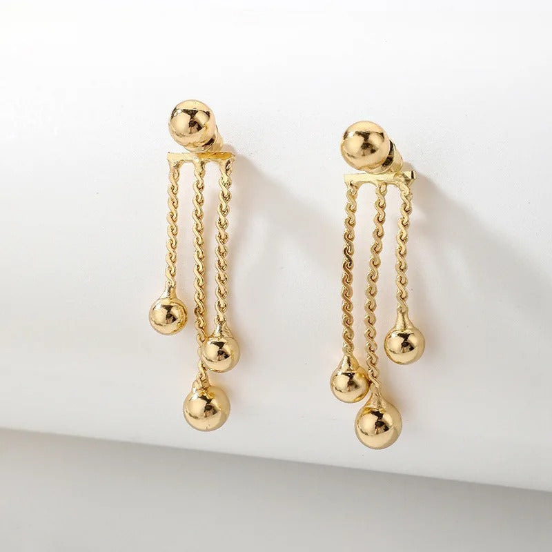 Boucle D'oreille Pendante Doré Élégante Image