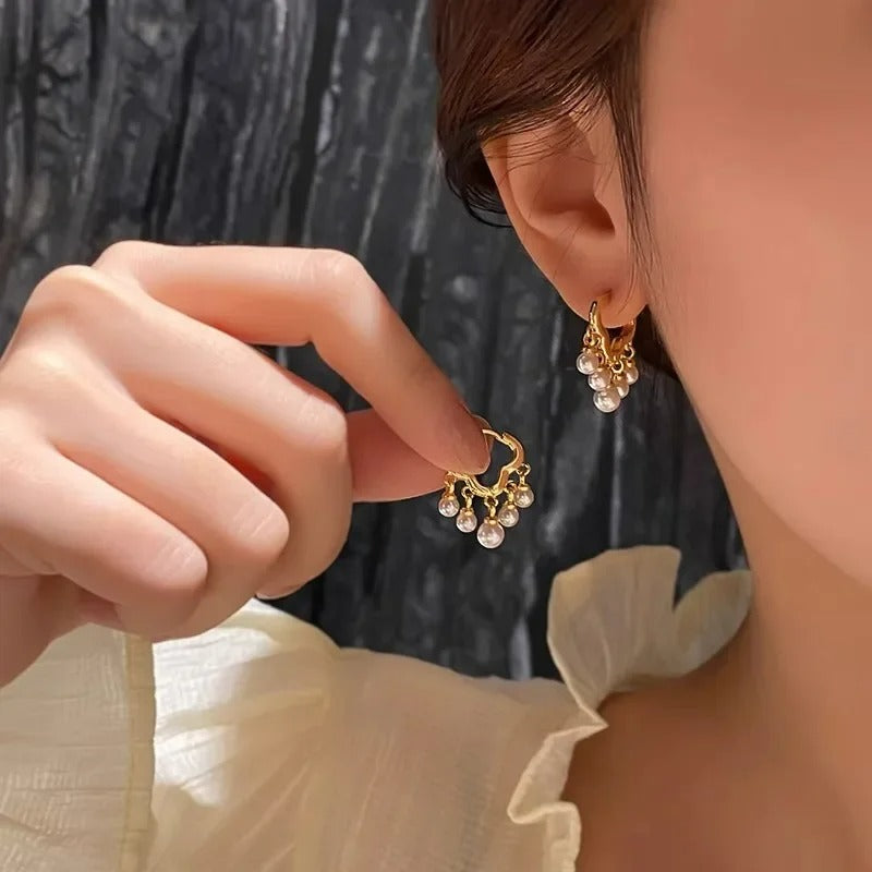 Boucle d'Oreille Perle Dorée Chic Image