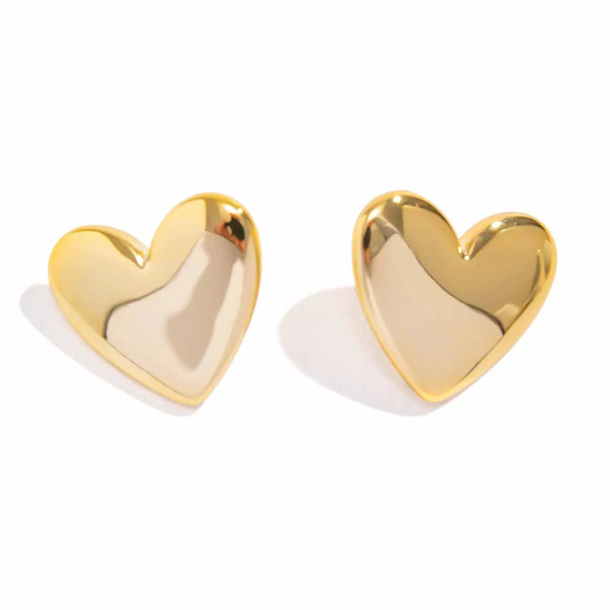 Boucle d'Oreille Coeur Dorée Élégante Image