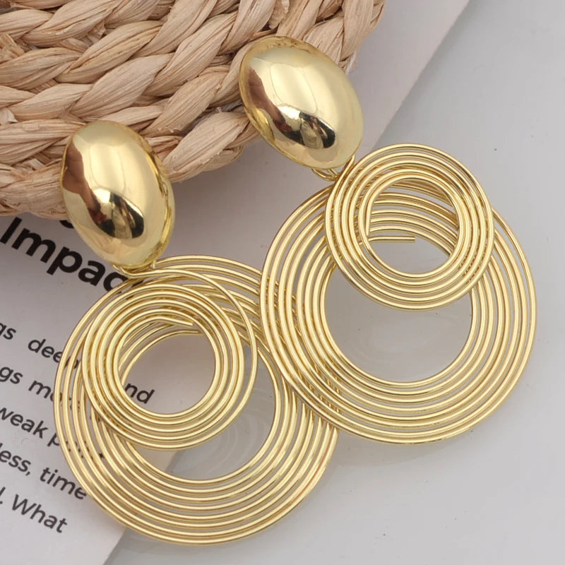 Boucle d'Oreille Doré et Ronde au Design Original – Ma Boucle d'Oreille
