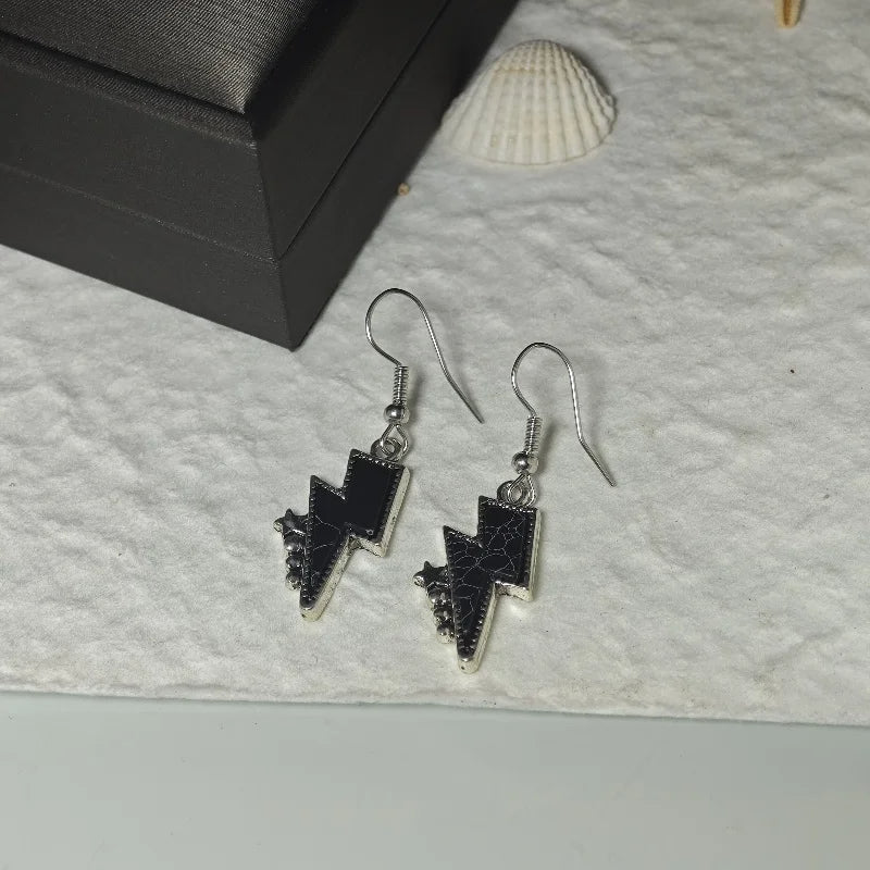 Boucle d'Oreille Eclair Design et Moderne Image