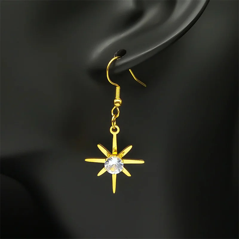 Boucle d'Oreille Etoile Dorée Raffinée en Acier Inoxydable Image