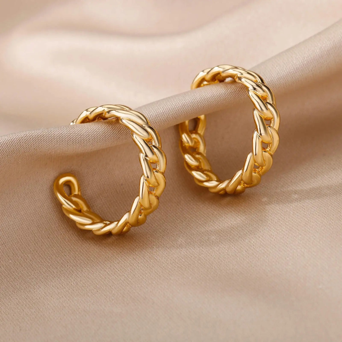Boucle d'Oreille Femme Acier Inoxydable Créole Cercle sur un tissu Image