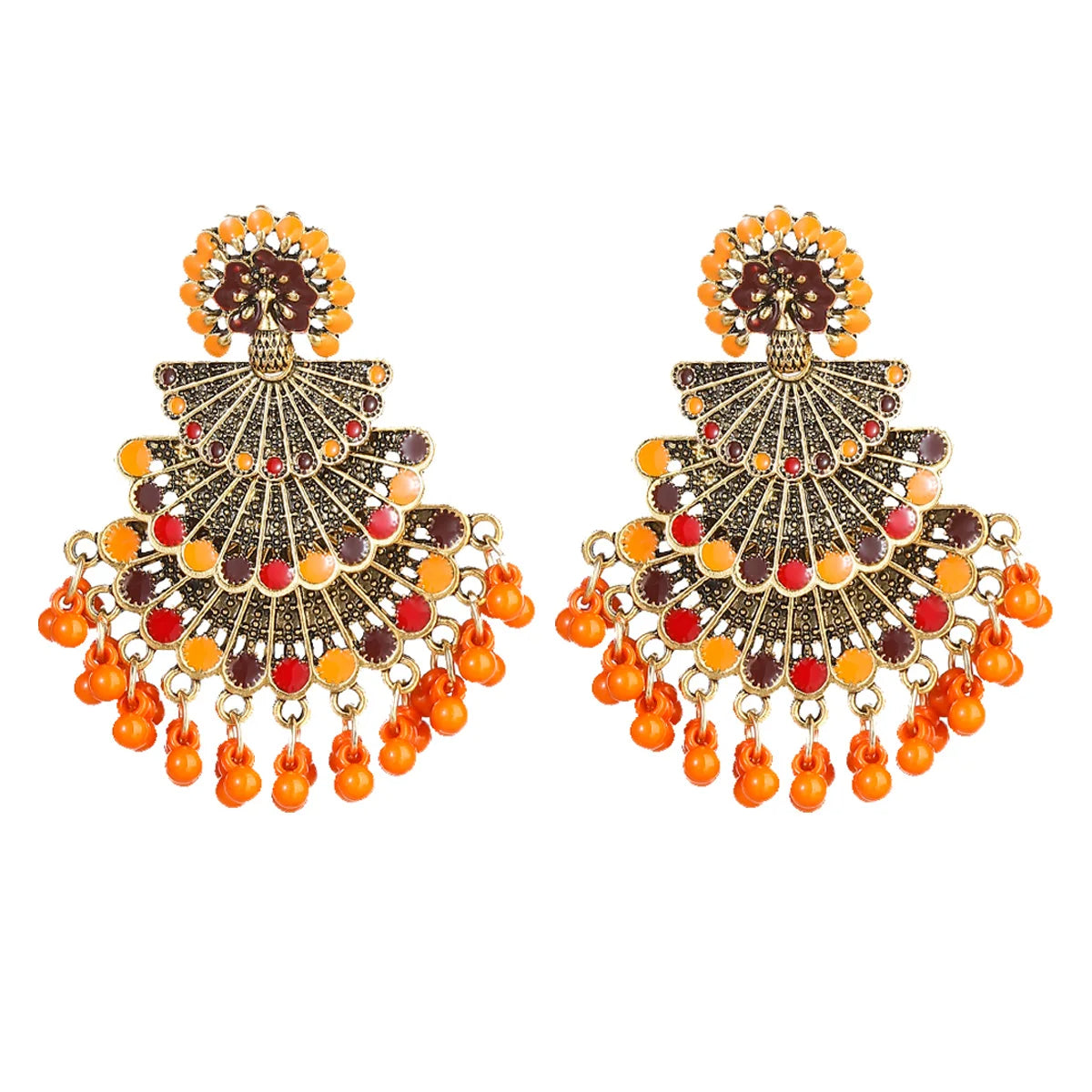 Boucle d'Oreille Gitane Vintage et Élégante sur fond blanc