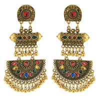 Boucle d'Oreille Gitane Vintage et Originale sur fond blanc