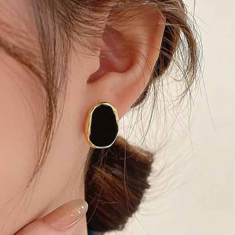 Boucle d'Oreille Noire Femme Vintage Image