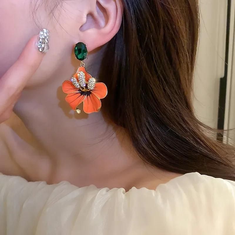Boucle D'oreille Orange Fleur Image