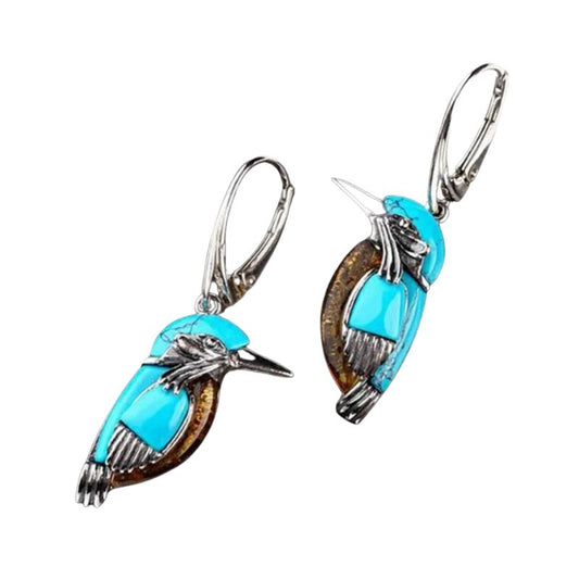 Boucle d'Oreille Turquoise Tendance en Forme d'Oiseau sur fond blanc