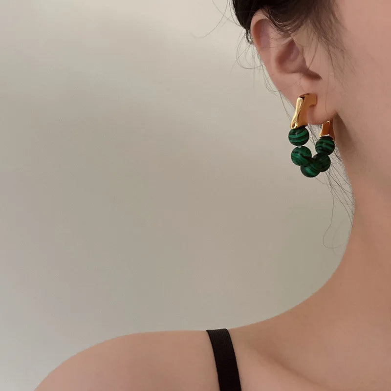 Boucle d'Oreille Verte Résistante et Durable