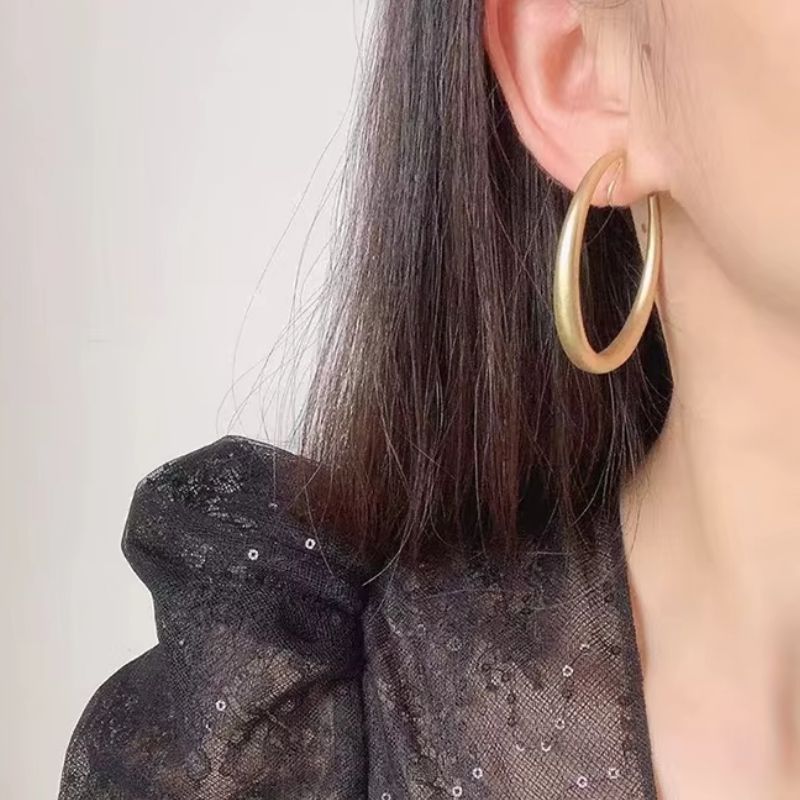 Boucles D'oreilles Clips Créoles Dorées Image