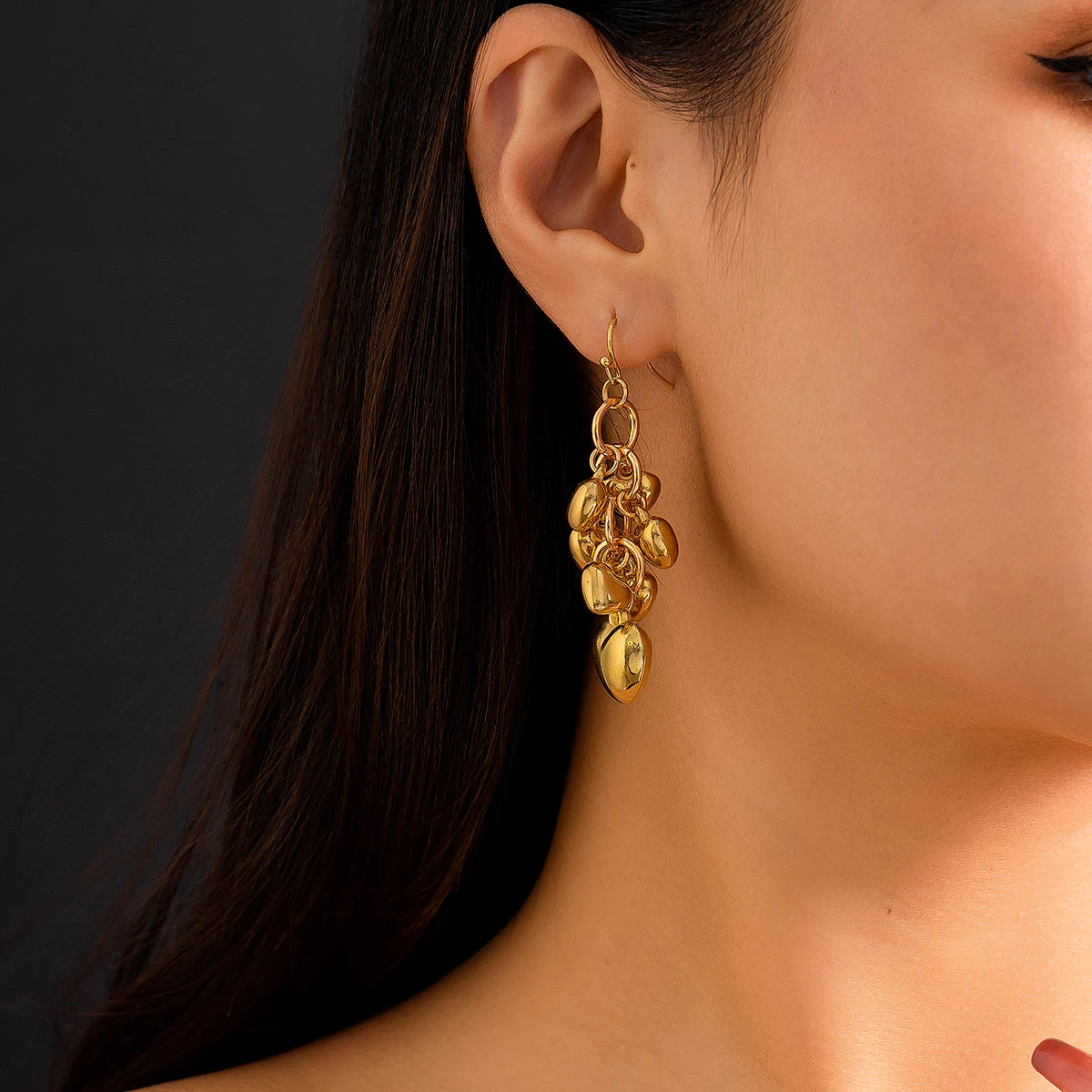 Boucles D'oreilles Pendantes Originales Cœurs en Cascade Image