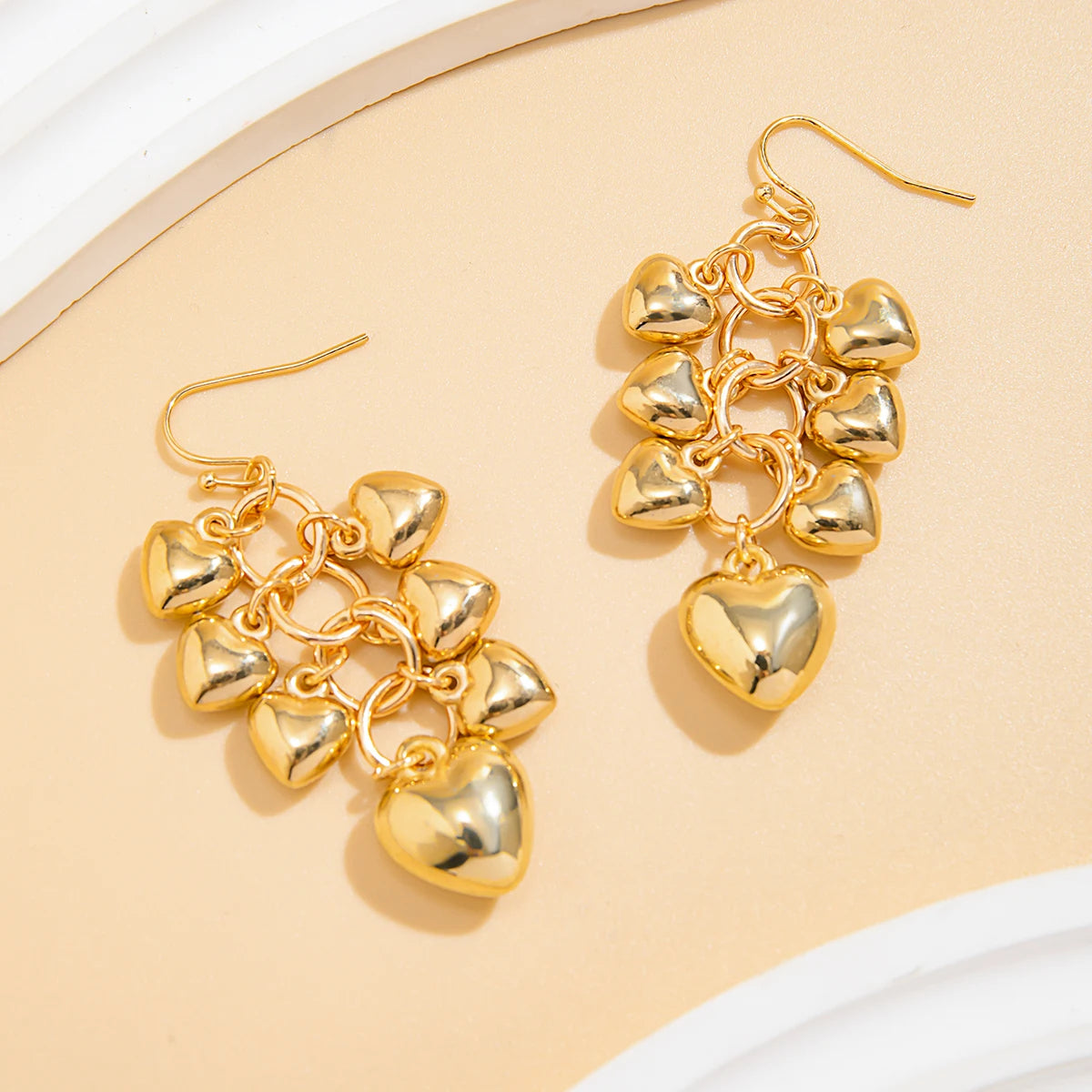 Boucles D'oreilles Pendantes Originales Cœurs en Cascade Image