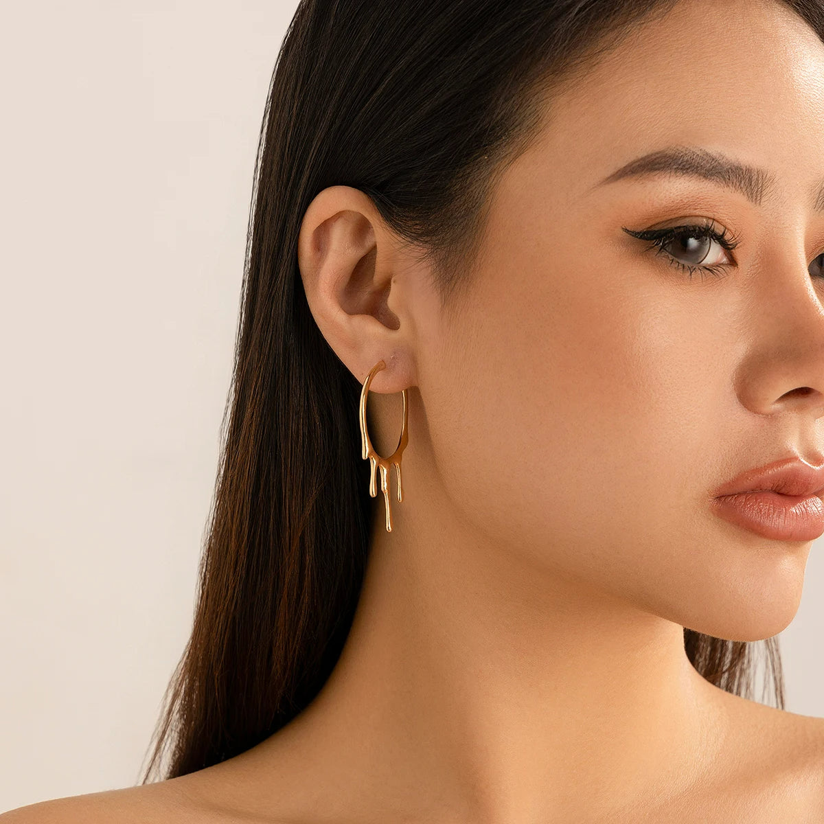 Boucles d'Oreilles Pendantes Originales Créoles Dorées Image