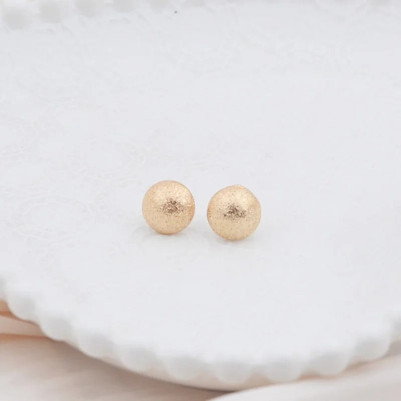 Petite Boucle d'Oreille Minimaliste